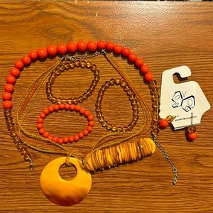 7 pc Necklaces, ear rings and Bracelets to match.